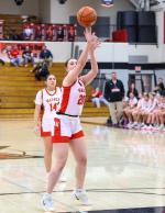 Ravyn Medricky shoots from the charity stripe. Photos by Barb Pechous